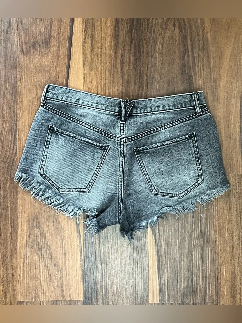 Free People black/charcoal low rise button fly denim cut off mini shorts